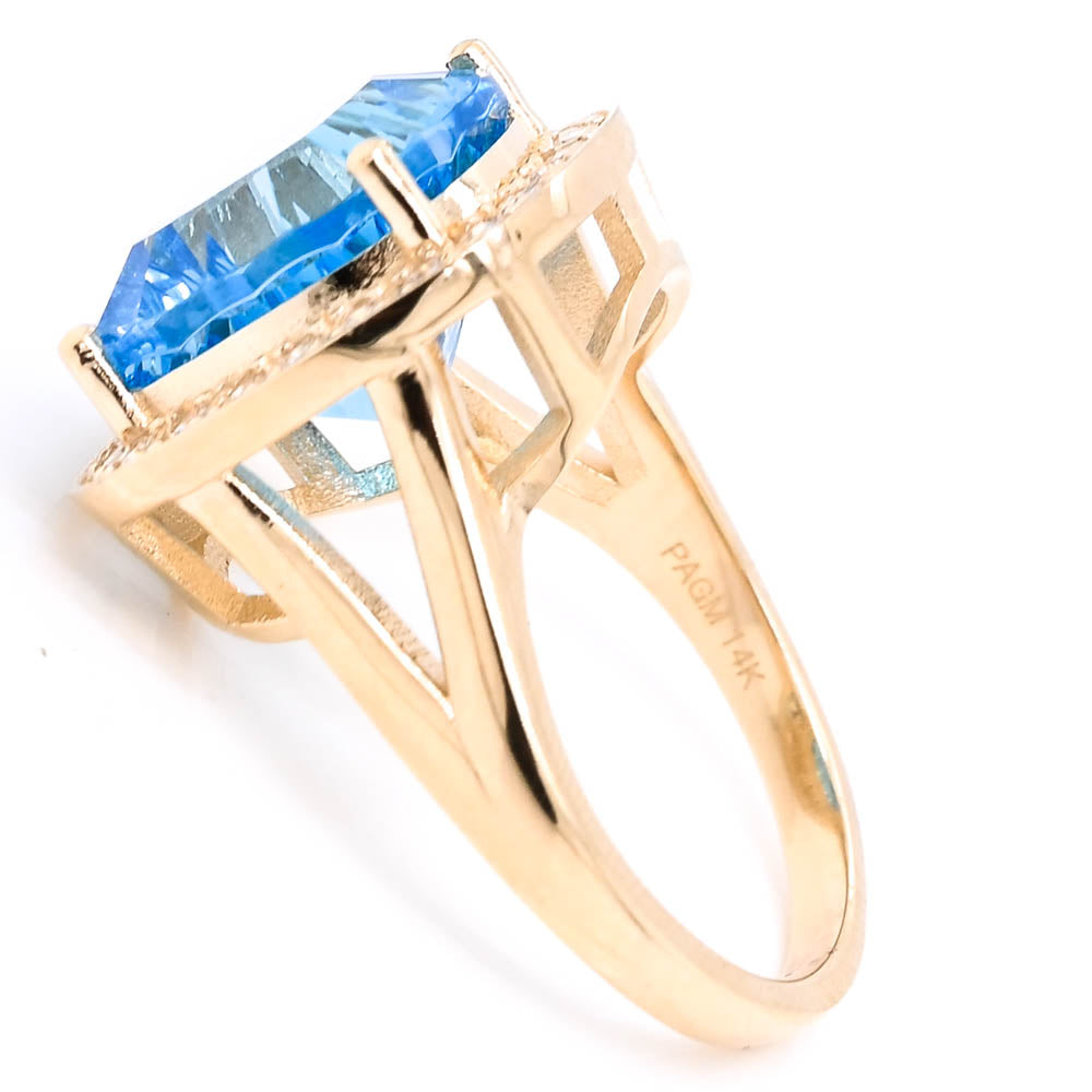 14KT Yellow Gold 8.40CT Blue Topaz & Diamond Halo Set Ring.