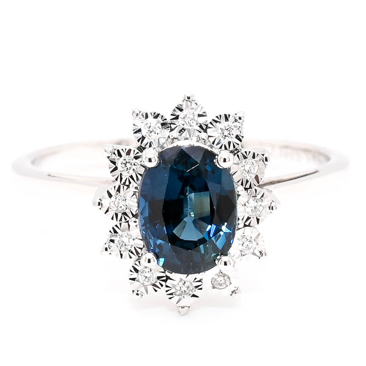 14KT White Gold 1.07CT Oval Shape Blue Sapphire & Diamond Cluster Ring.