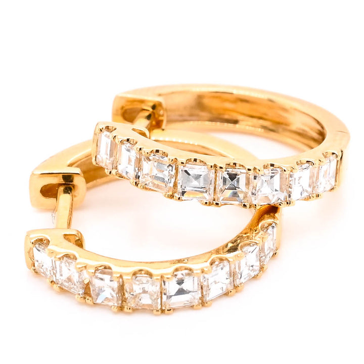 18KT Yellow Gold 0.85CTW Diamond Huggie Earrings.