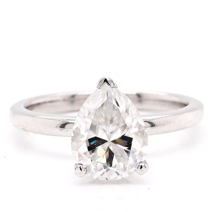 14KT White Gold 1.73CT Pear Shape Moissanite & Diamond Ring.