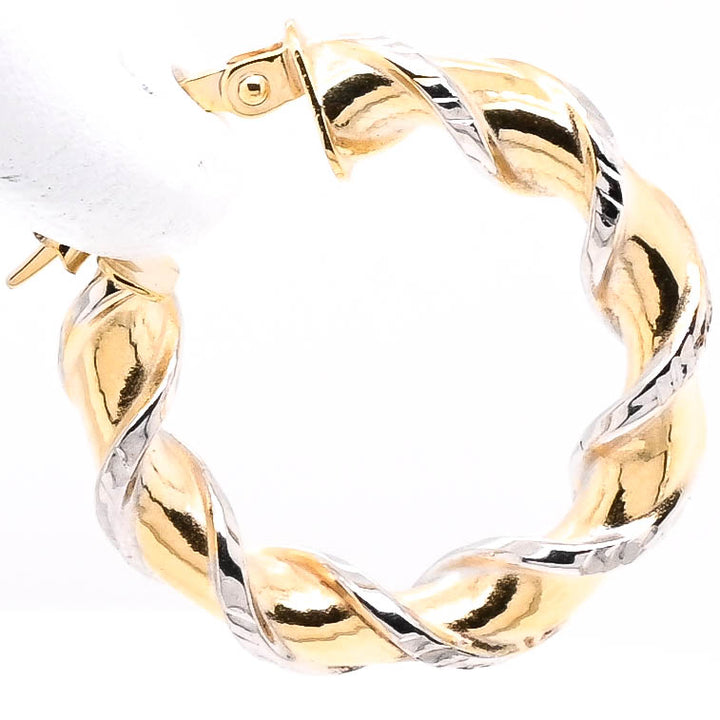 10KT Two-Tone Gold Twisted Hoop Earrings.