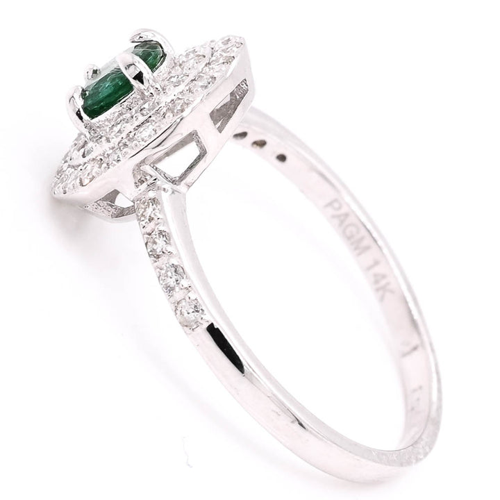 14KT White Gold Emerald & Diamond double Halo Set Ring.

Diamonds: 0