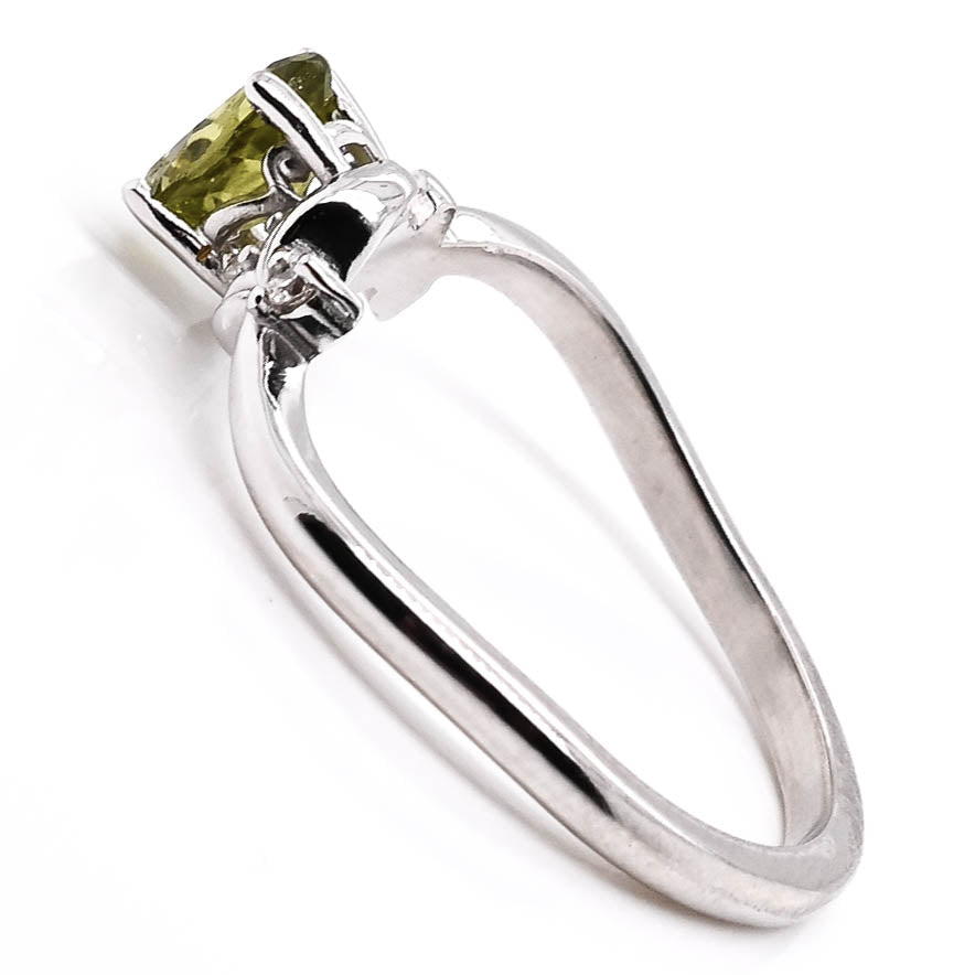 10KT White Gold Oval Shape Peridot and Diamond Ring.