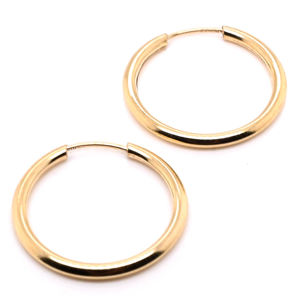 10KT Yellow Gold 12mm Sleeper Earrings.