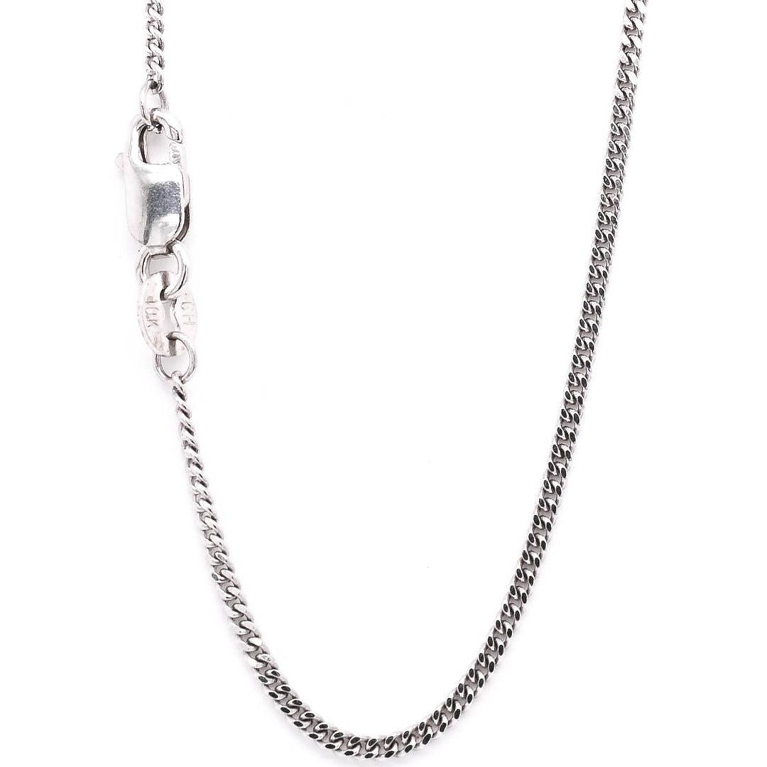 10KT White Gold 18" 1.5mm Curb Link chain.