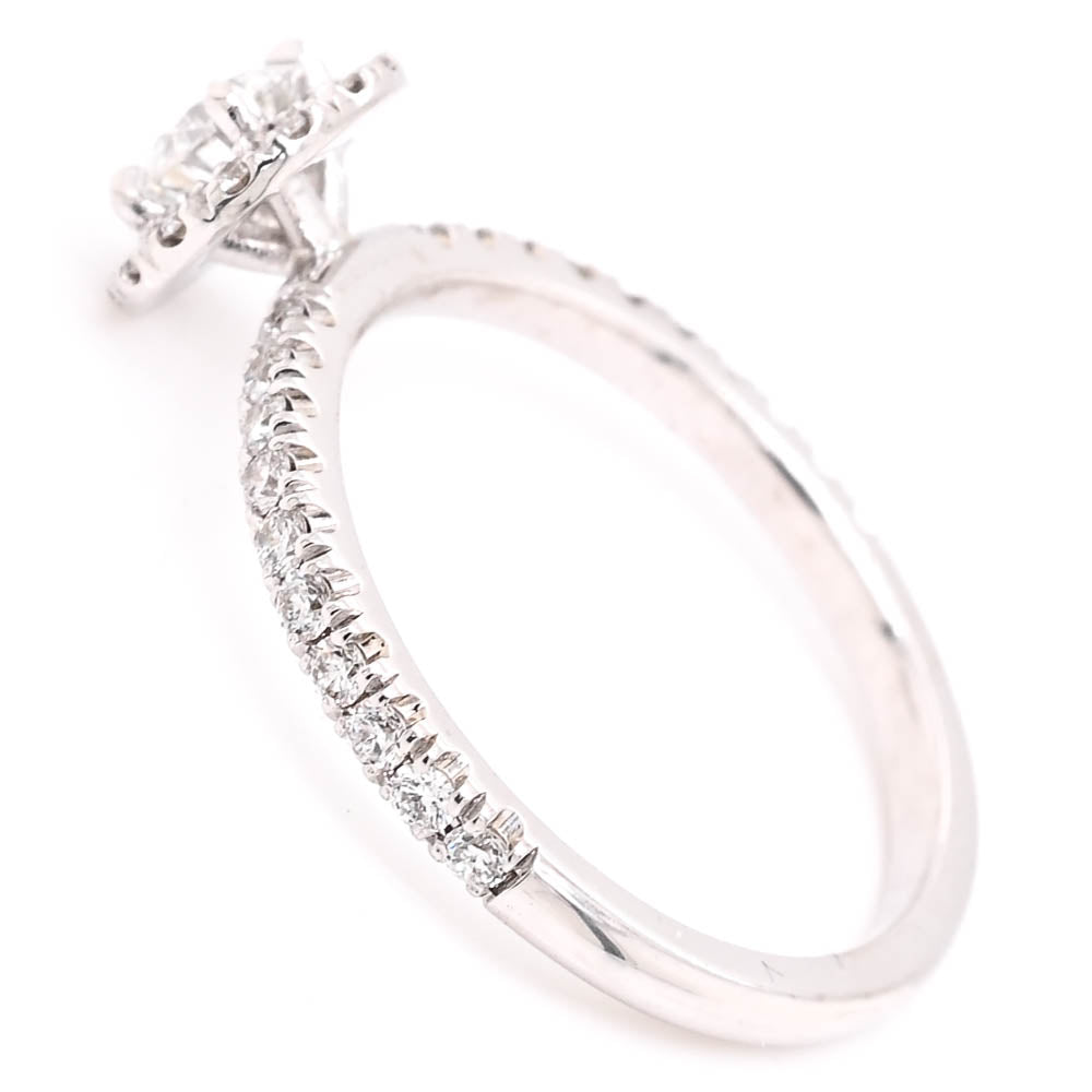 14KT White Gold 0.68CTW Round Brilliant Diamond Halo Set Engagement Ring.