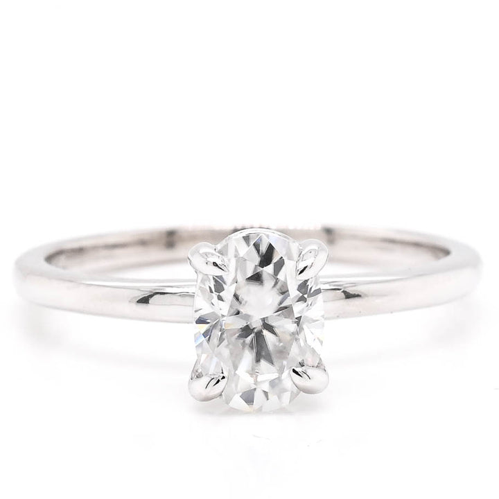 14KT White Gold 7x5mm Oval Shape Moissanite Solitaire Ring.