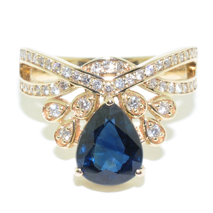 14KT Yellow Gold Blue Sapphire and Diamond Ring.