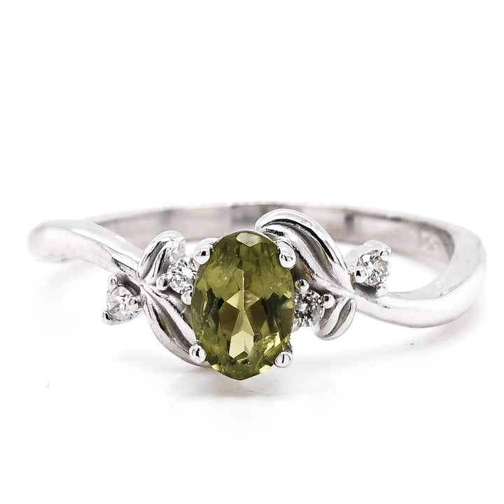 10KT White Gold Oval Shape Peridot and Diamond Ring.