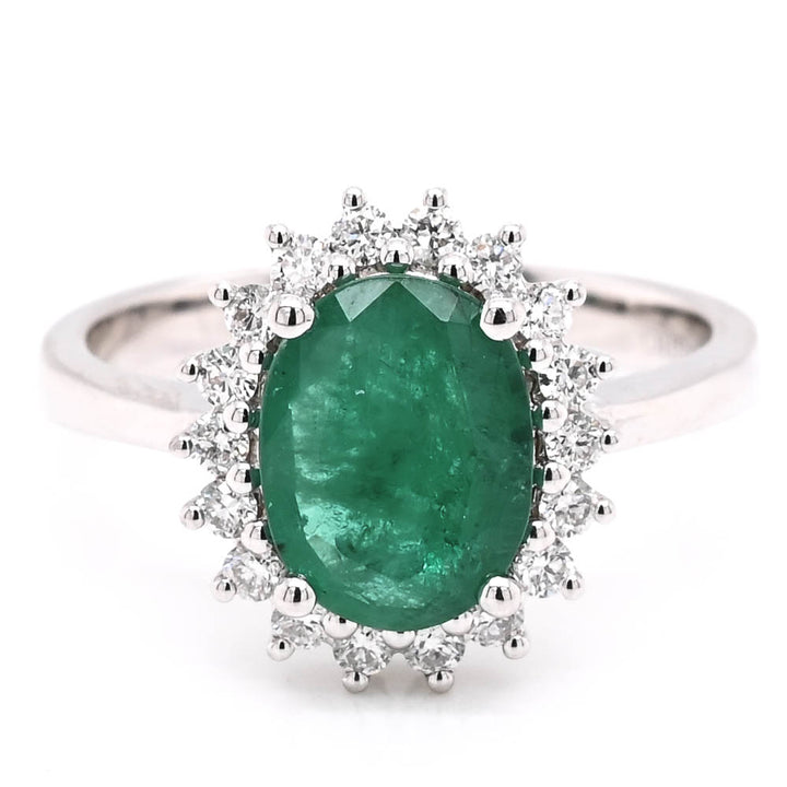 14KT White Gold 1.44CT Oval Shape Emerald & Diamond Cluster Ring.