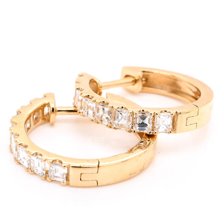 18KT Yellow Gold 0.85CTW Diamond Huggie Earrings.