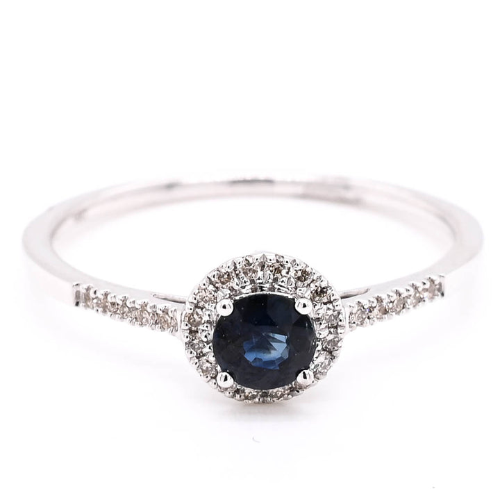 14KT White Gold 0.30CT Round Brilliant Blue Sapphire & Diamond Halo Set Ring.