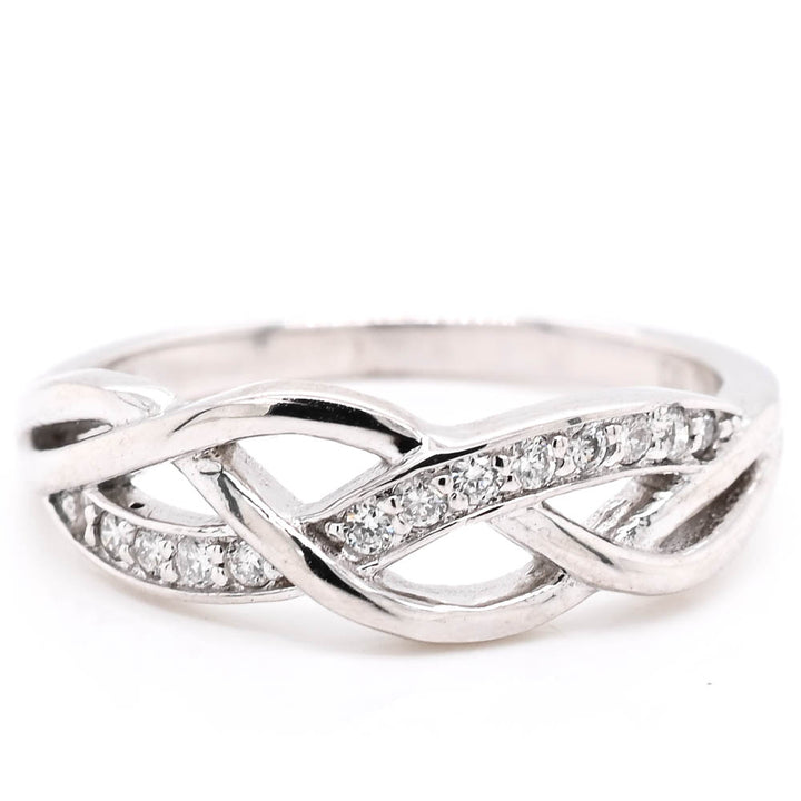 14KT White Gold 0.13CTW Diamond Ring.