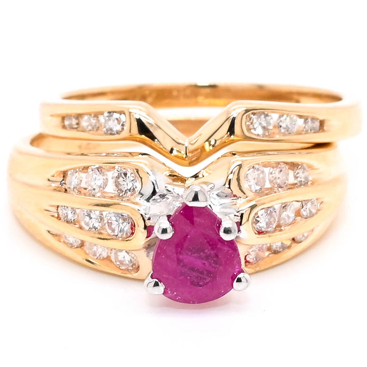 14KT Yellow Gold 0.78CT Pear Shape Ruby and Diamond Ring with matching Diamond Band.