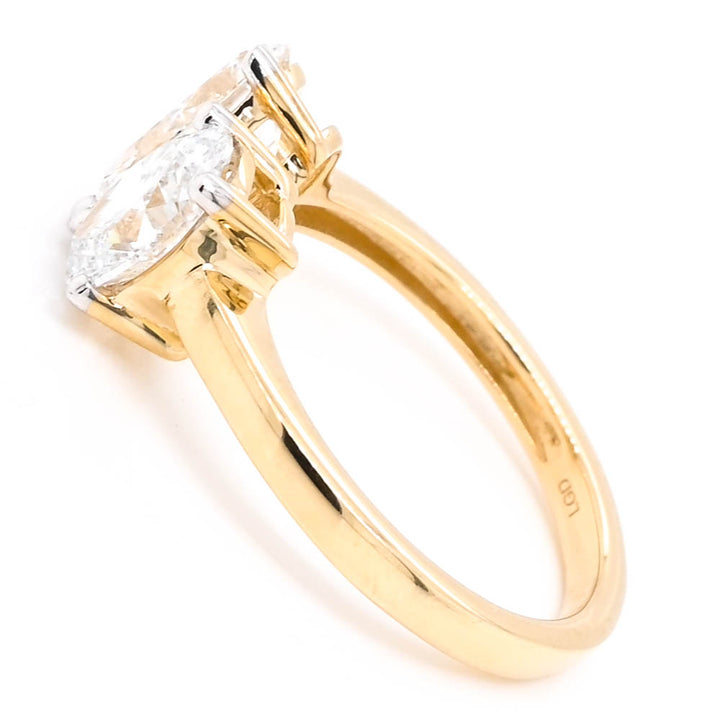 14KT Yellow Gold 2.00CTW Pear & Oval Shape Lab Grown Diamond Ring.