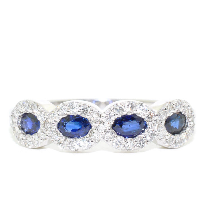 14KT White Gold Blue Sapphire and Diamond Ring.