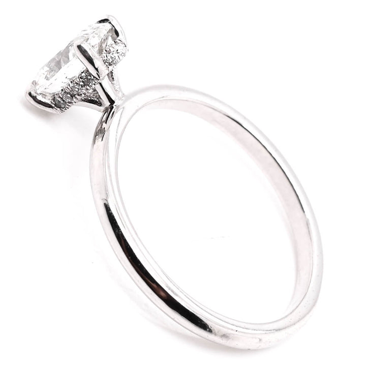 14KT White Gold 1.07CTW Oval Shape Hidden Halo Engagement Ring.