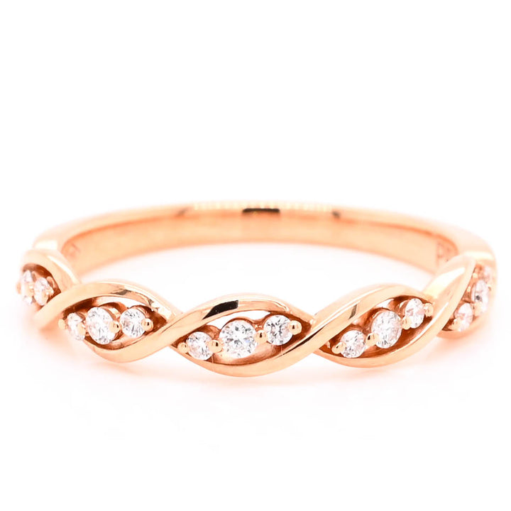 18KT Rose Gold 0.14CTW Diamond Ring.