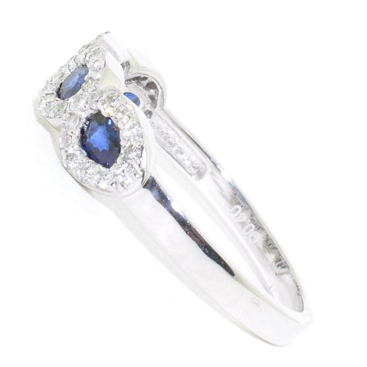 14KT White Gold Blue Sapphire and Diamond Ring.