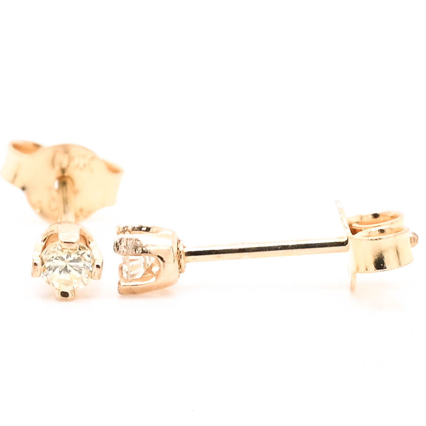 10KT Yellow Gold 0.10CTW Round Brilliant Diamond Stud Earrings.