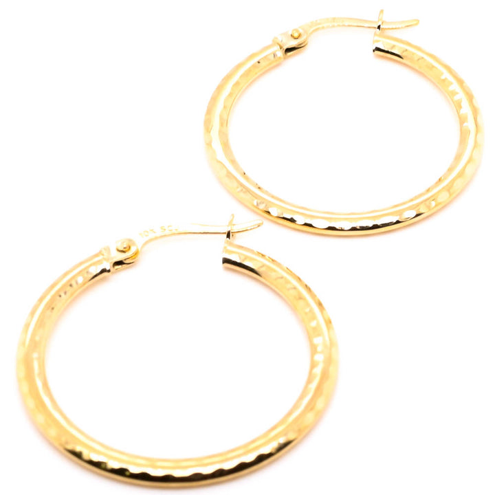 10KT Yellow Gold Medium Hoop Earrings.