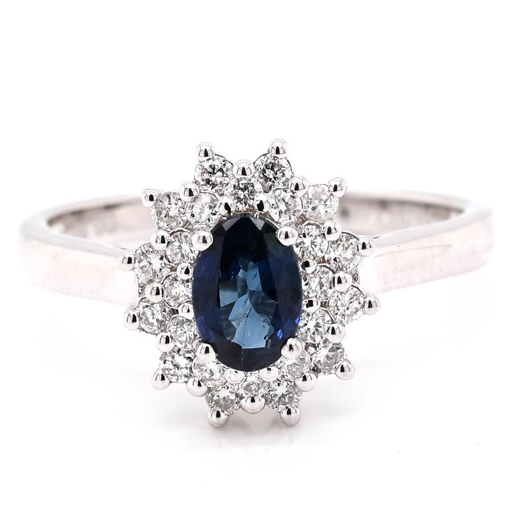 14KT White Gold Blue Sappire & Diamond Cluster Ring.