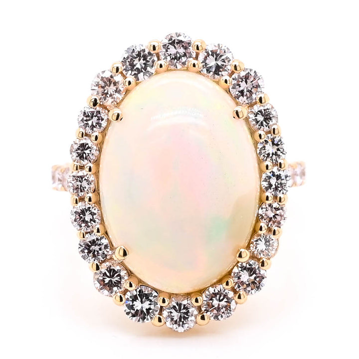 14KT Yellow Gold 7.01CT Opal & Fancy Light Pink Diamond Halo Set Ring.