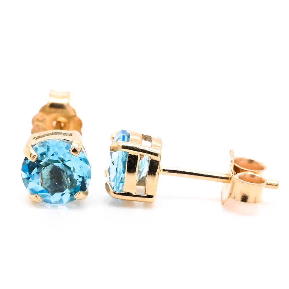 14KT Yellow Gold Blue Topaz Stud Earrings.