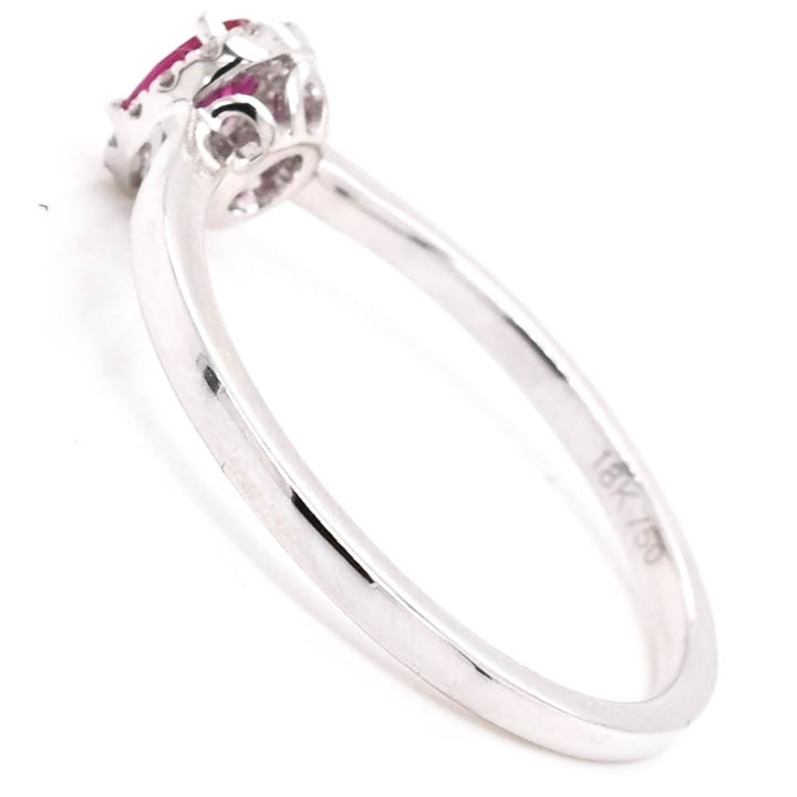 18KT White Gold 0.25CT Ruby and Diamond Halo Set Ring.