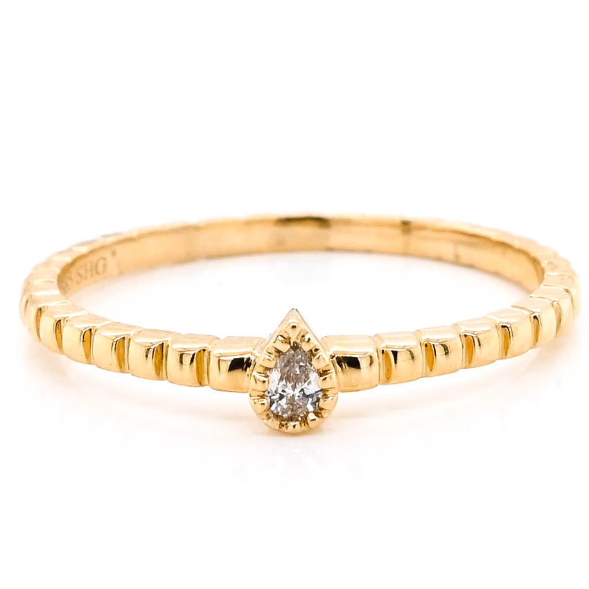 14KT Yellow Gold 0.07CTW Pear Shape Diamond Stackable Ring.