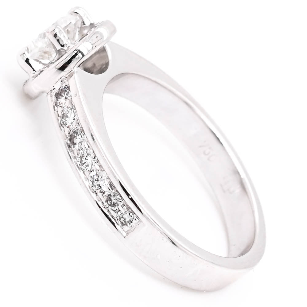 18KT White Gold 1.04CTW Round Brilliant Diamond Halo Set Engagement Ring.