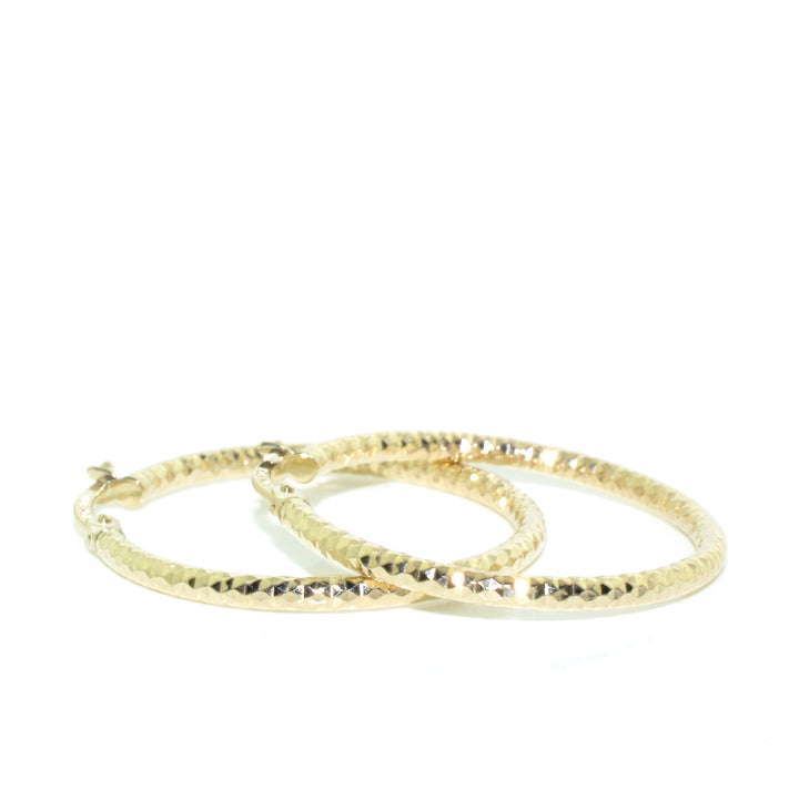 10KT Yellow Gold Medium Hoop Earrings.