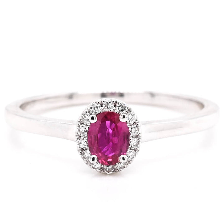 18KT White Gold 0.25CT Ruby and Diamond Halo Set Ring.