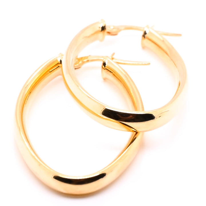 10KT Yellow Gold Oval Large Hoop Earrings.